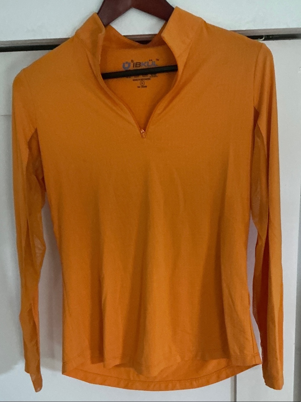 IBKUL women’s Long Sleeve Quarter-Zip Shirt in Bright Orange